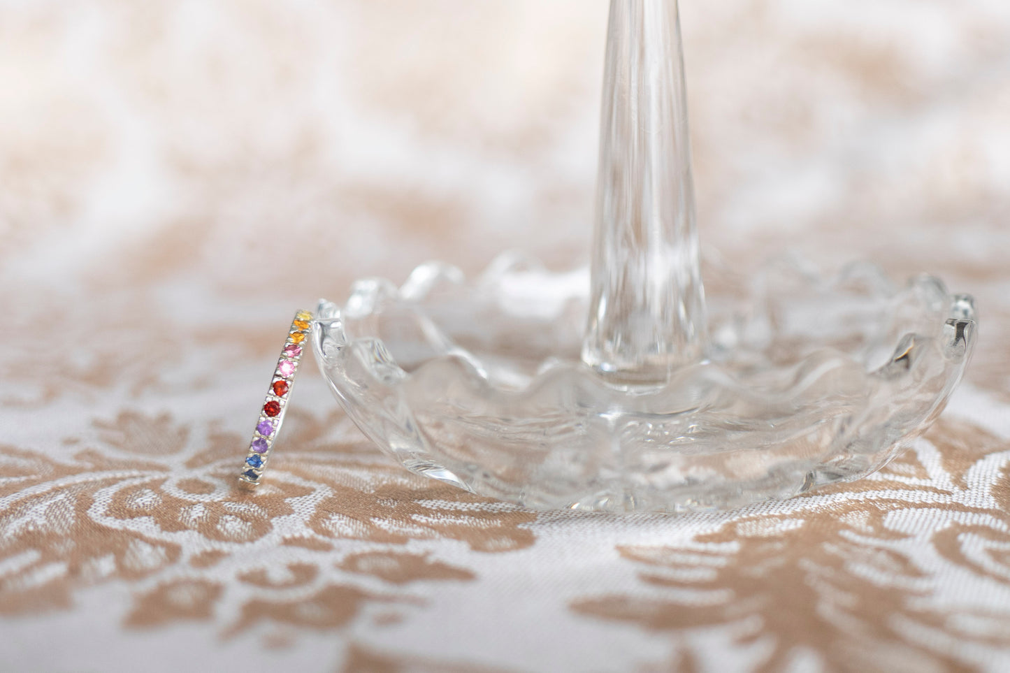 sterling silver pave ring with multiple gemstones in the colors of sunset