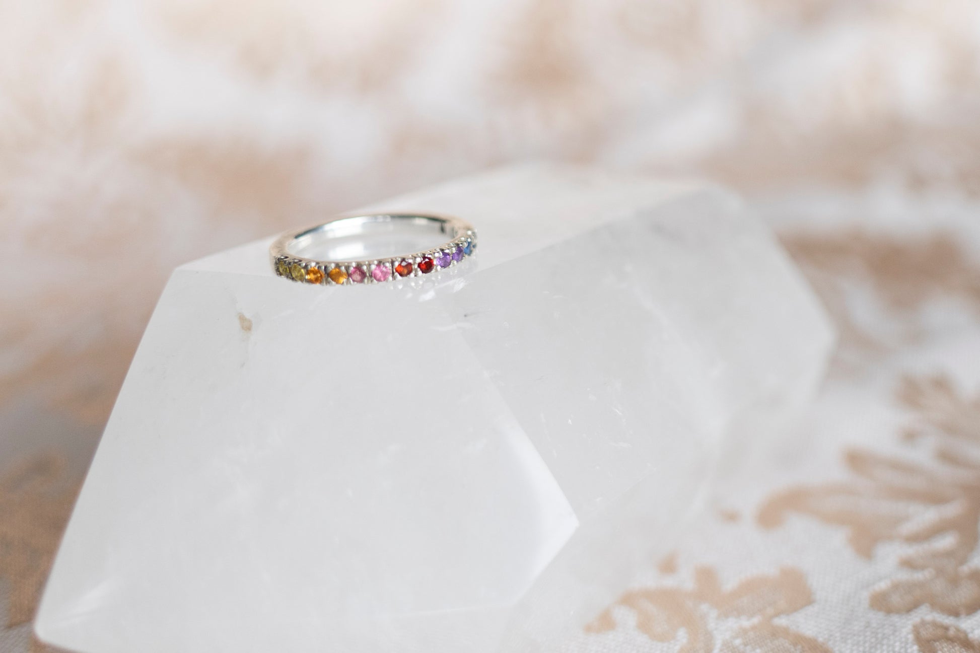 sterling silver pave ring with sunset colored gemstones