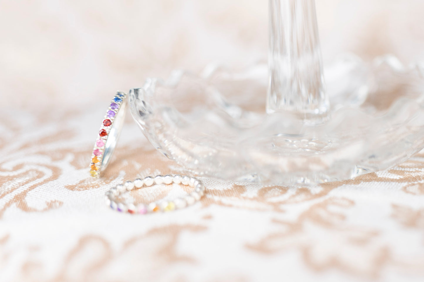 sunset inspired ring created from natural gemstones set in a pave ring