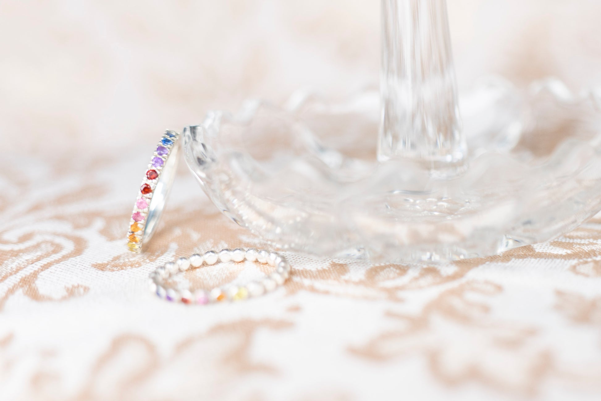 sunset inspired ring created from natural gemstones set in a pave ring