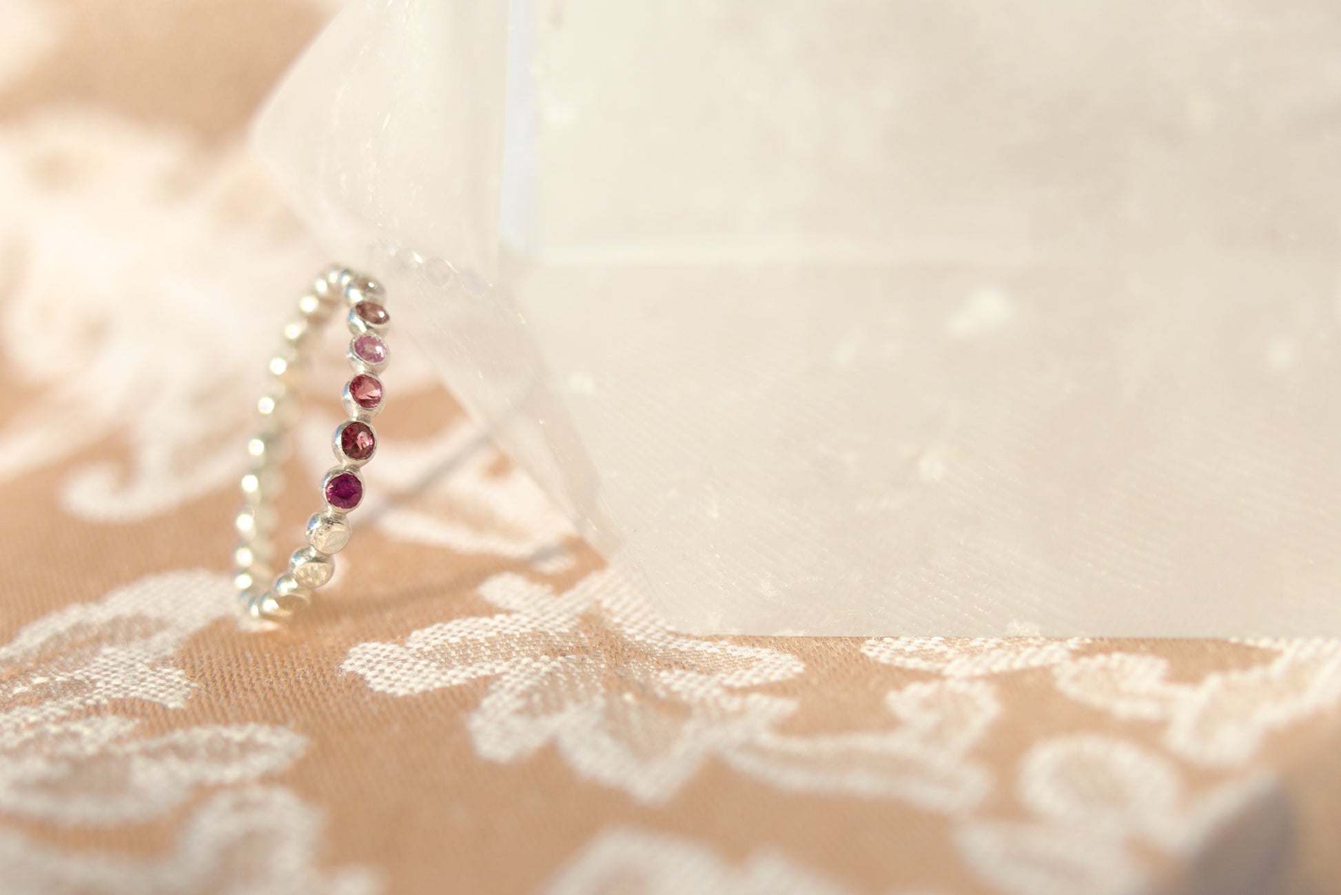 Pink ring with different pink stone colors