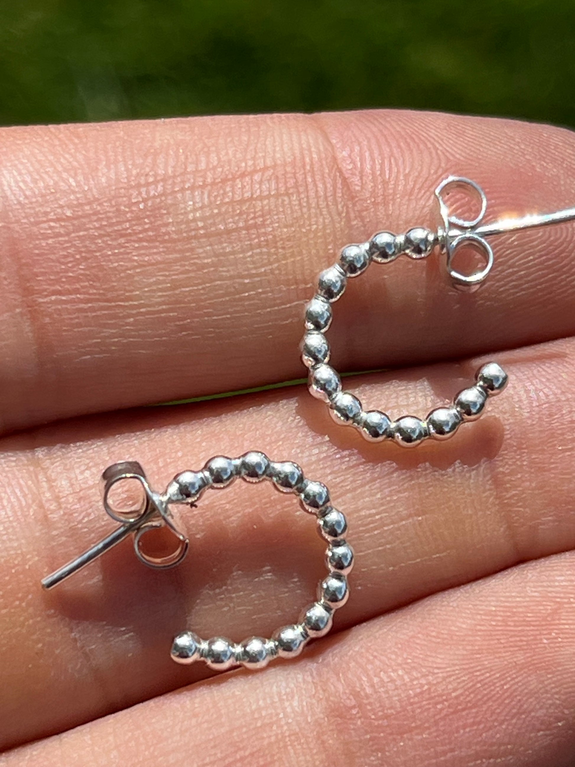 Silver bead huggie earrings